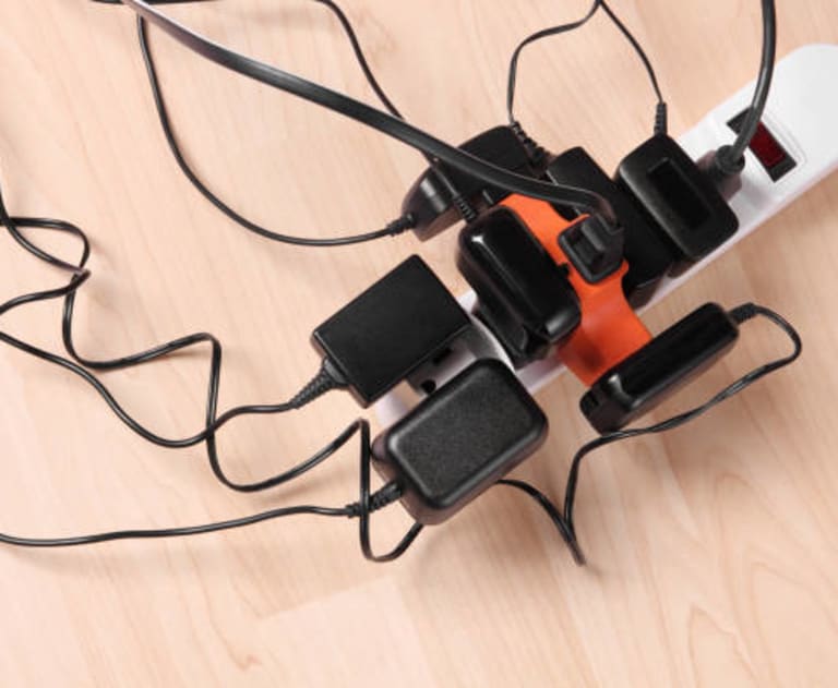 Too many cords plugged into an outlet
