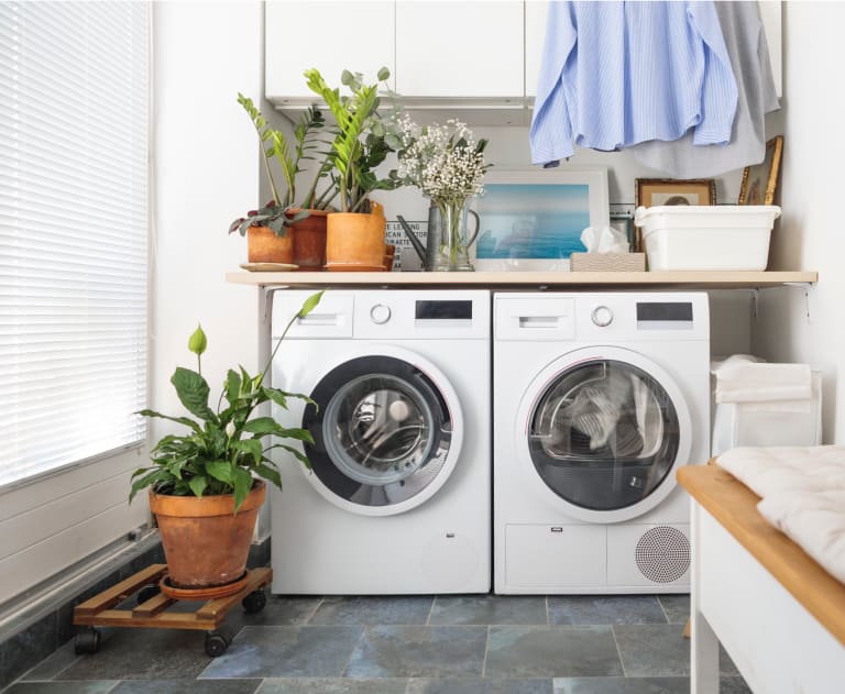 White washer and dryer in a modern laundry room