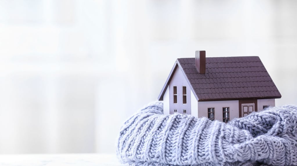 Home heating tips home wrapped in a sweater
