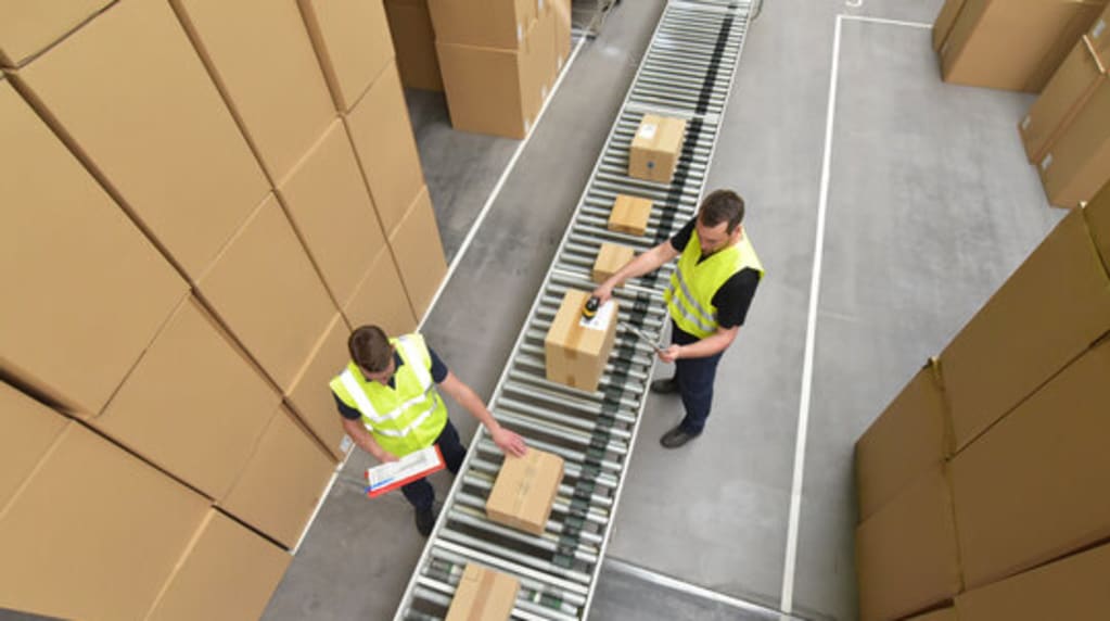 warehouse conveyor systems powered by the work of an electrician near me
