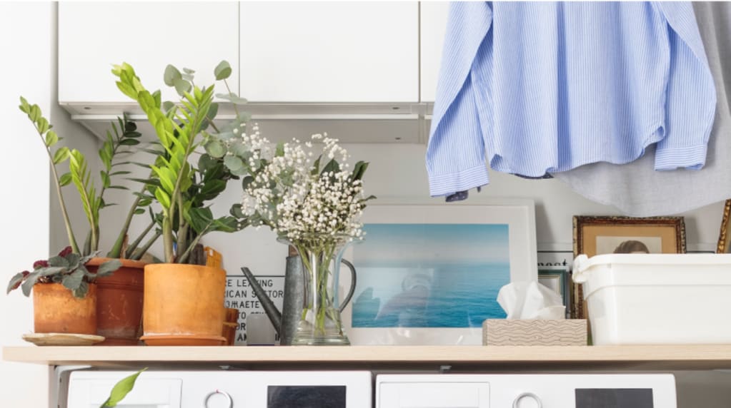 White washer and dryer in a modern laundry room