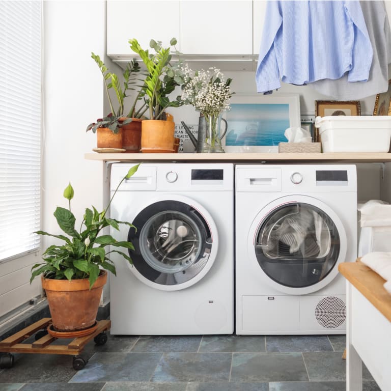 White washer and dryer in a modern laundry room