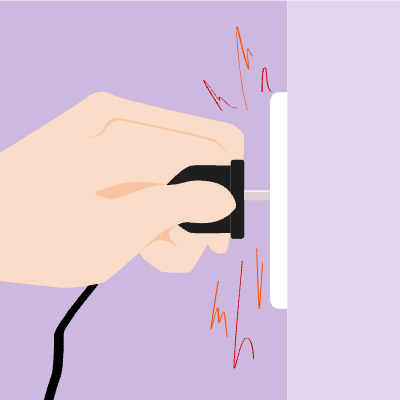 Hand plugging in cord and getting shocked