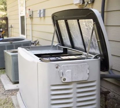 Generator being installed outside a home