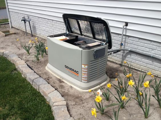 Standby Generac generator outside a home