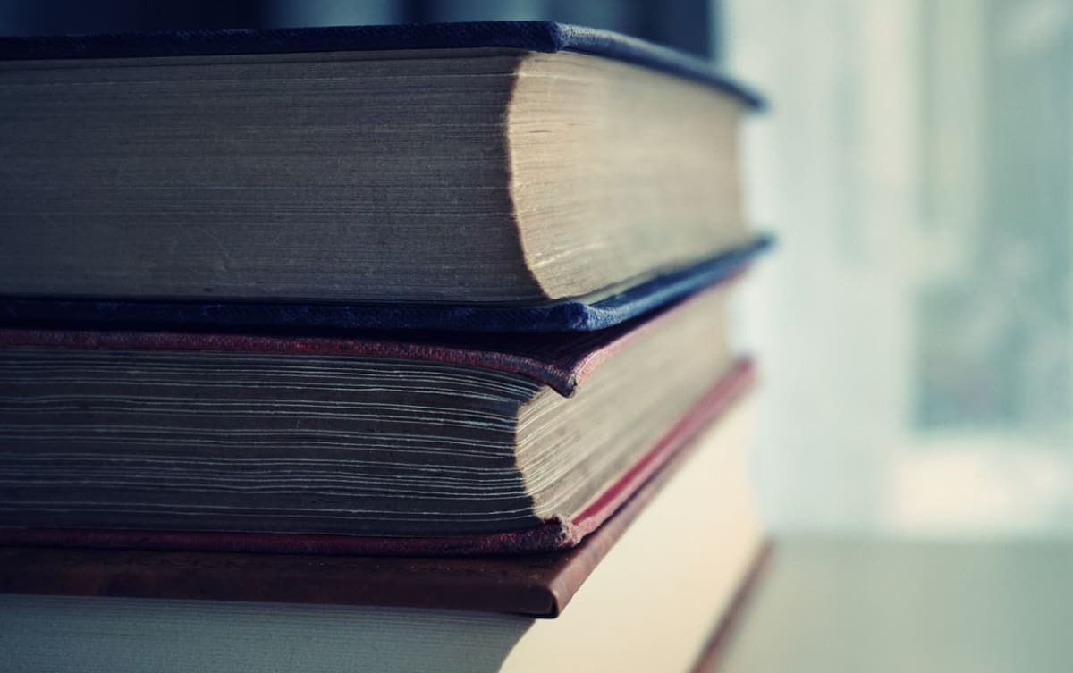 A stack of course books