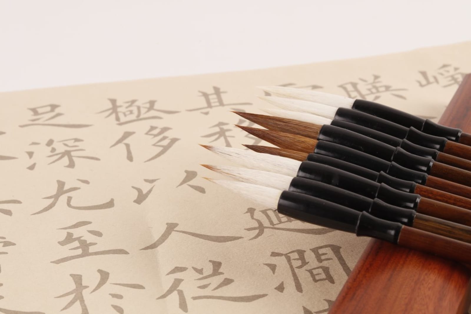Practising calligraphy with brush and ink