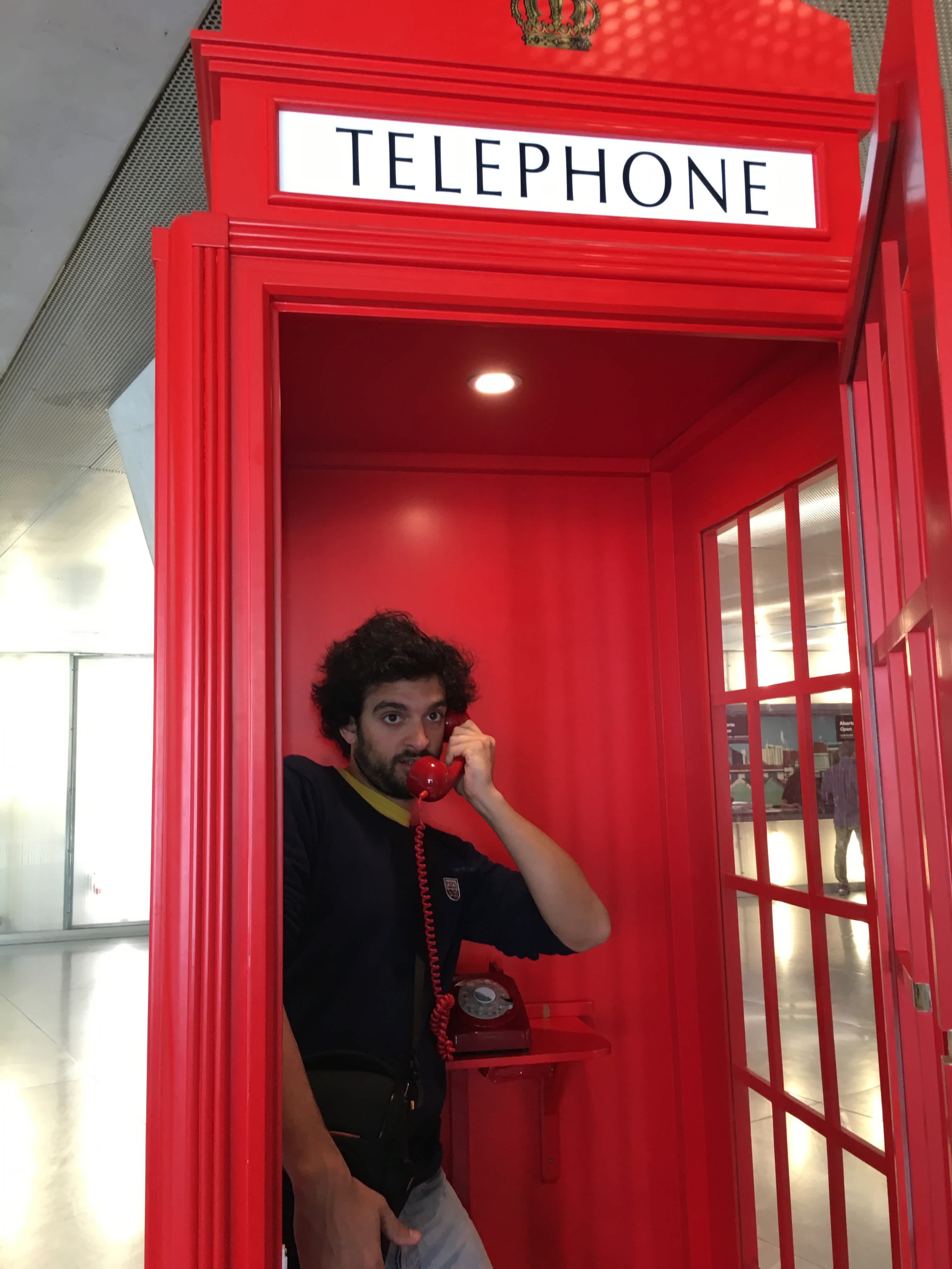 Diogo in a london phone booth