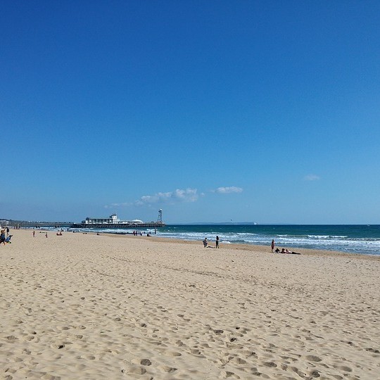 Is a large coastal resort town on the south coast 