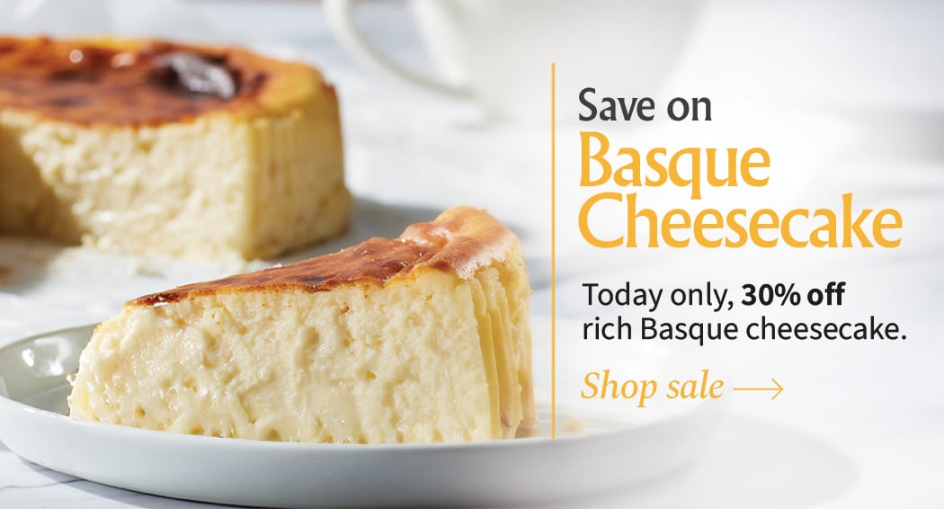 Sliced Jamon in a plate with some olives and a knife out of focus