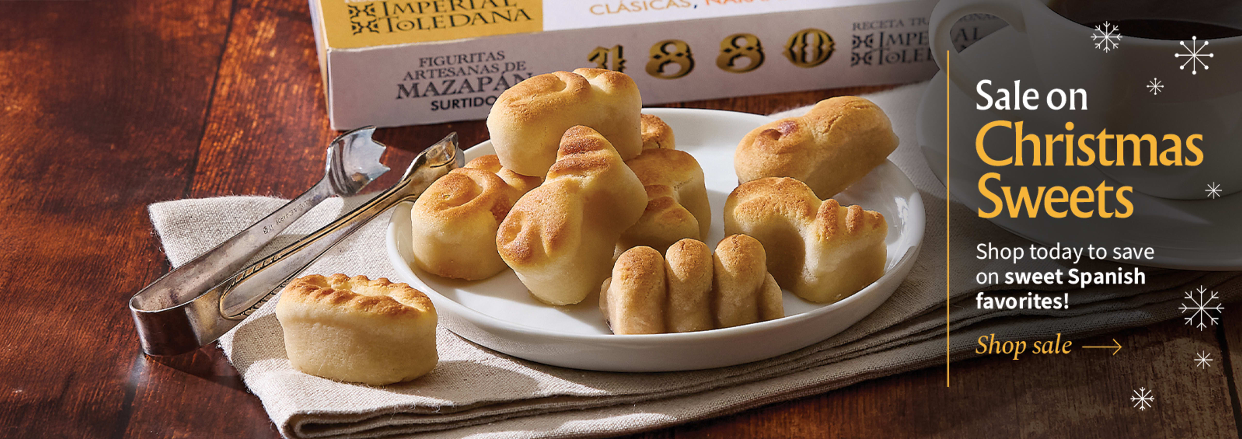 Sliced Jamon in a plate with some olives and a knife out of focus