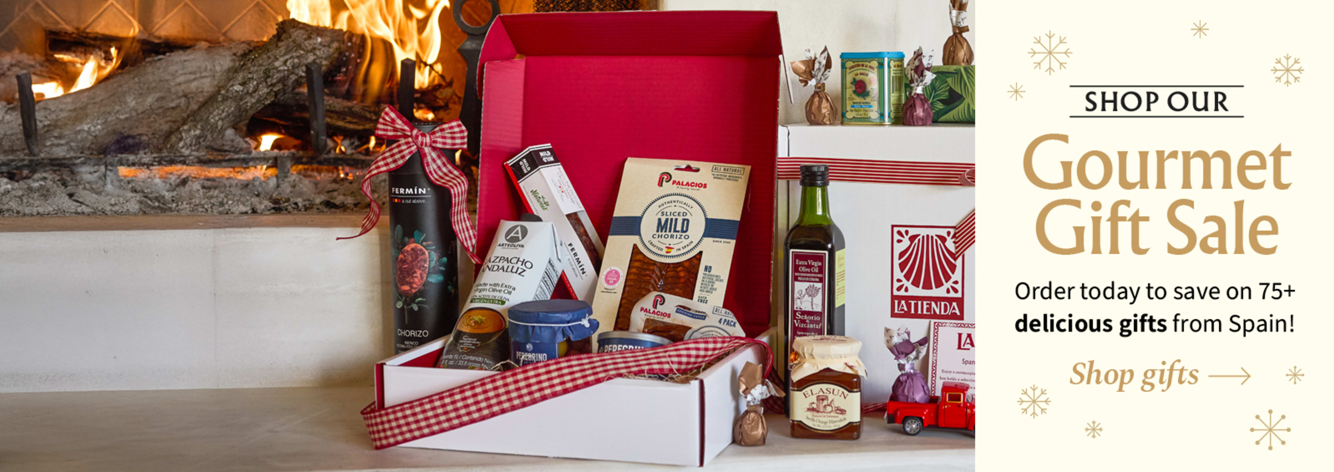 Sliced Jamon in a plate with some olives and a knife out of focus