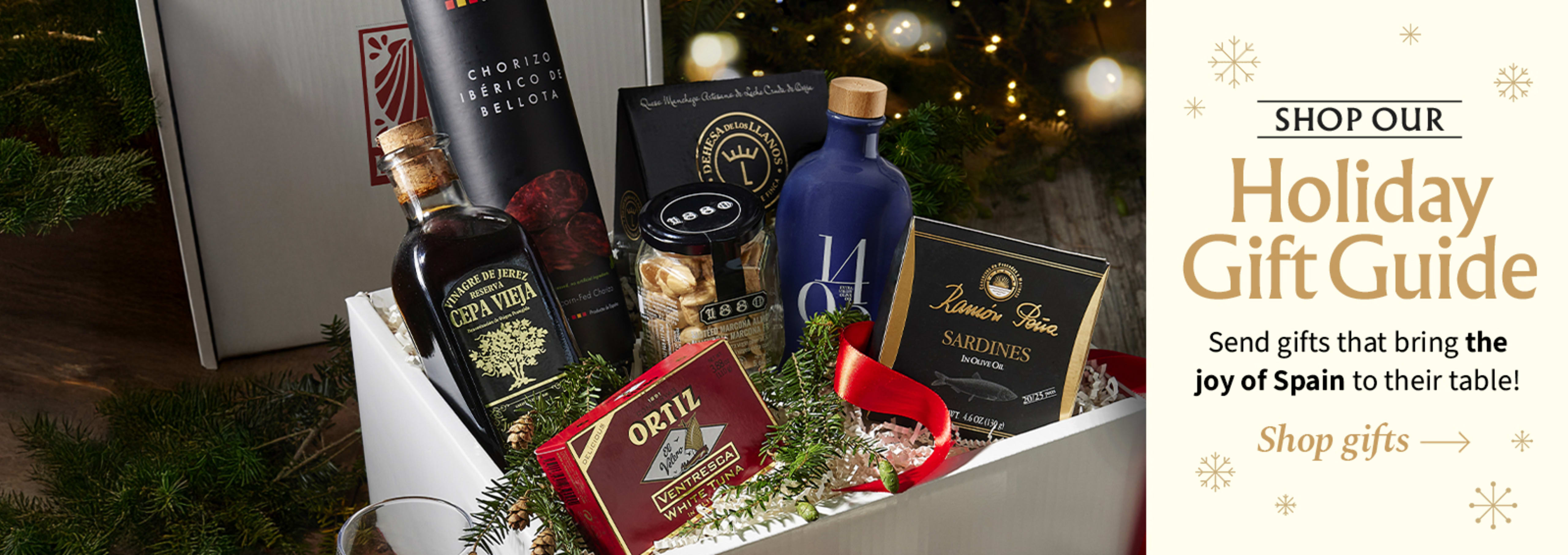 Sliced Jamon in a plate with some olives and a knife out of focus