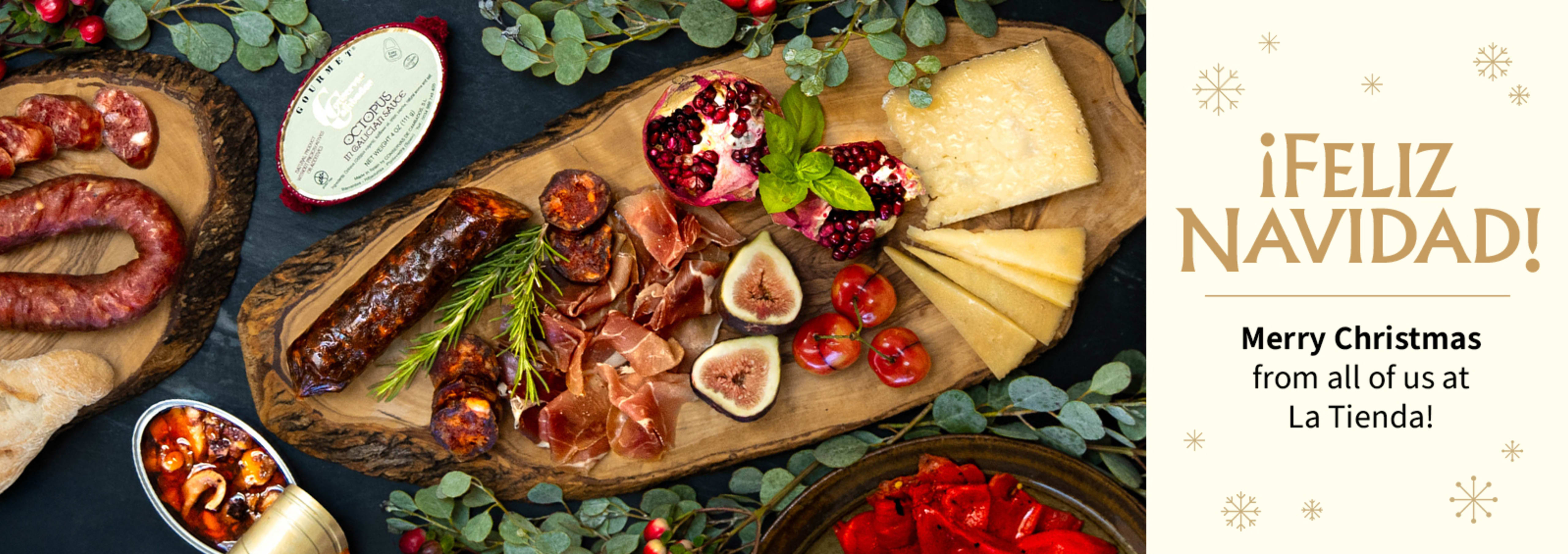Sliced Jamon in a plate with some olives and a knife out of focus