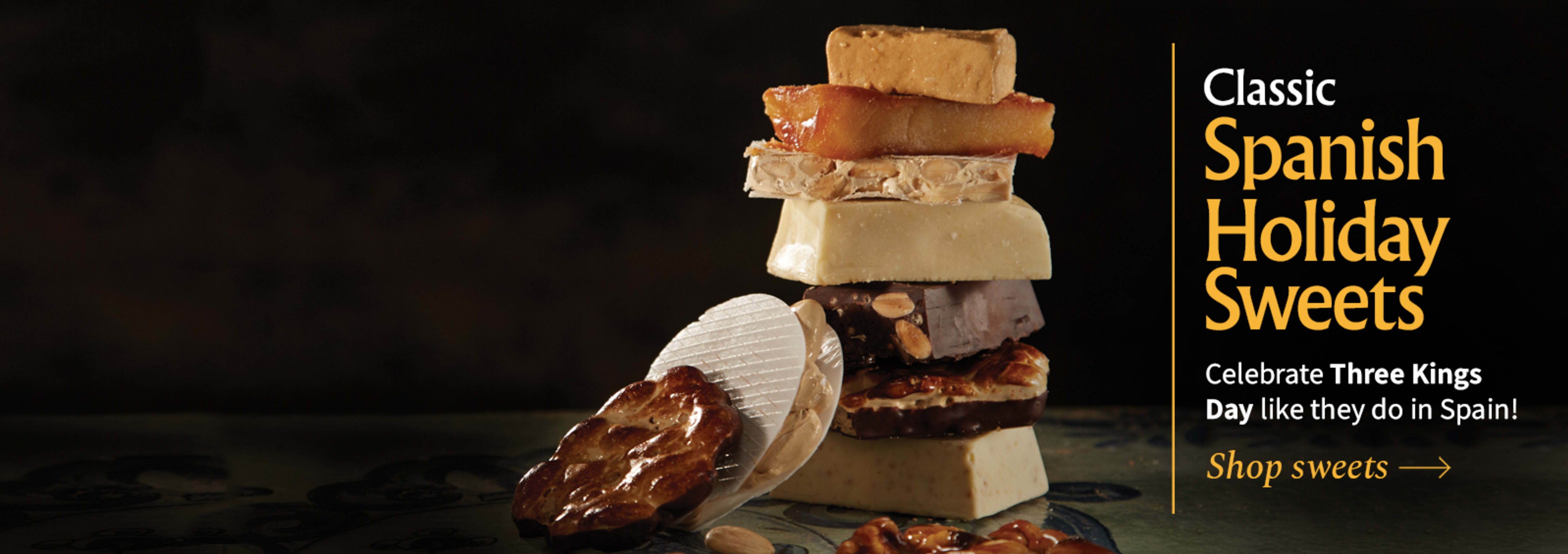 Sliced Jamon in a plate with some olives and a knife out of focus