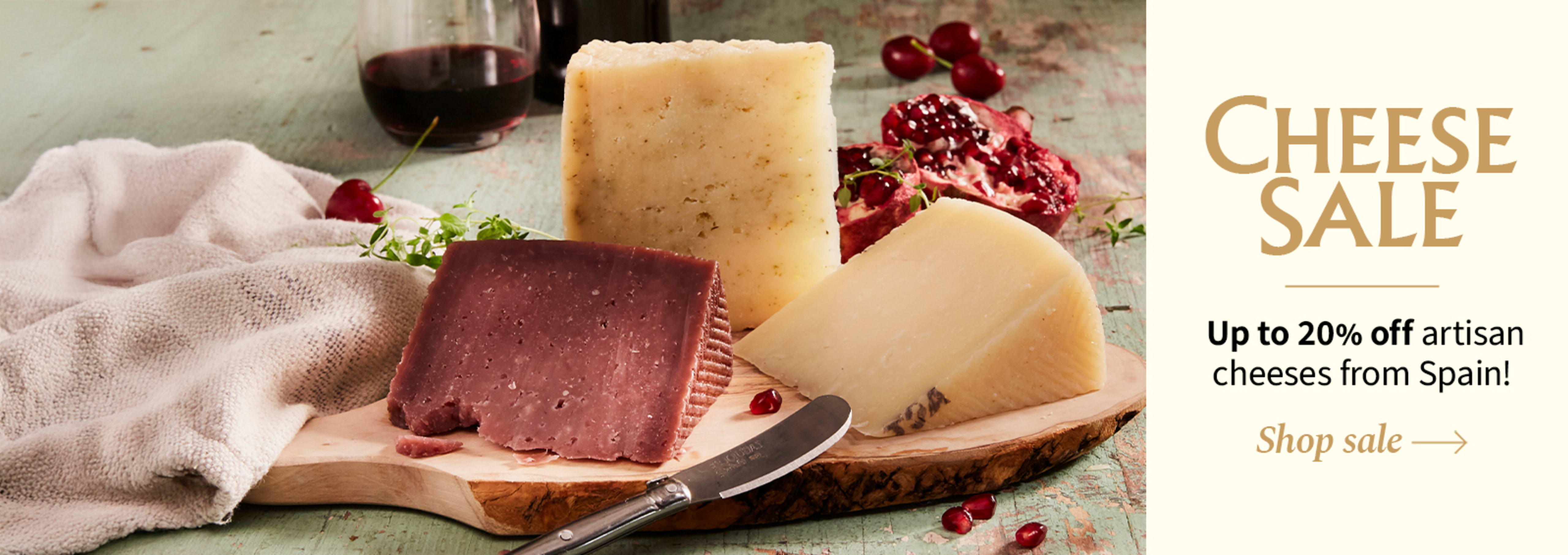 Sliced Jamon in a plate with some olives and a knife out of focus