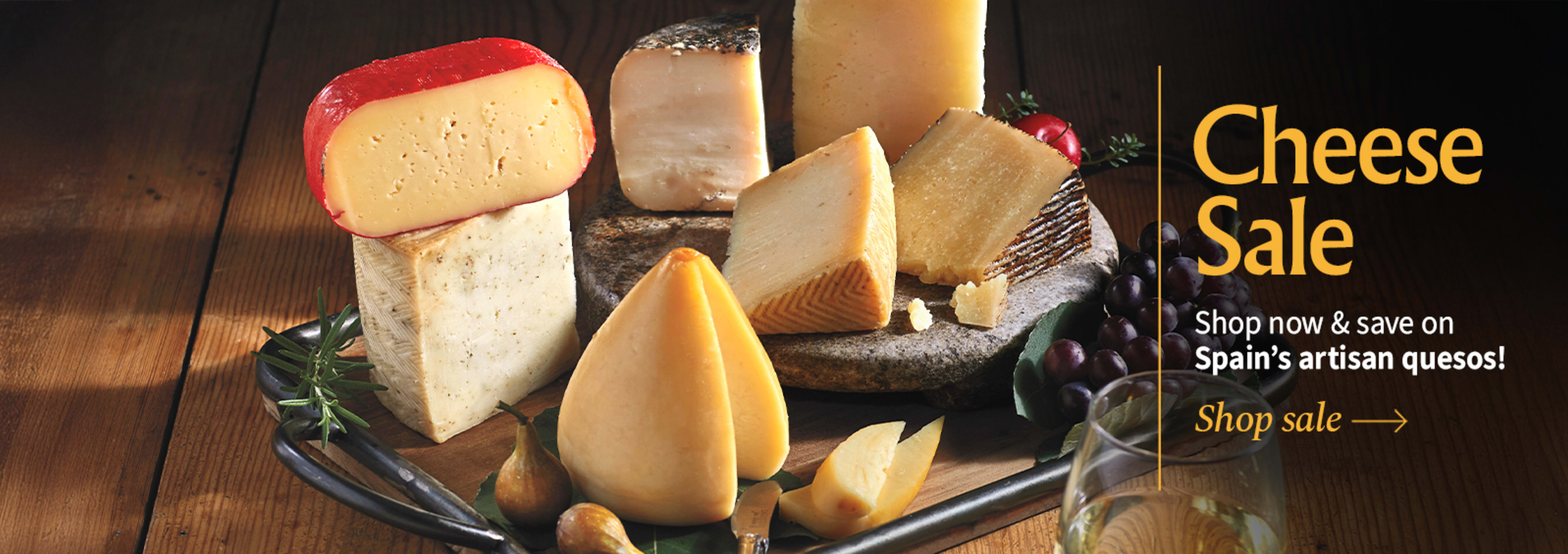 Sliced Jamon in a plate with some olives and a knife out of focus