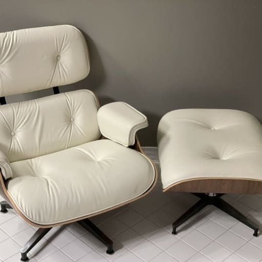 Herman Miller Eames Lounge Chair & Ottoman - Valnød, elfenbenskind