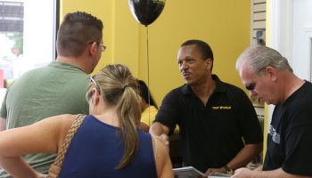 Staff talking to customers