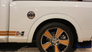 White Car with Orange Wheels