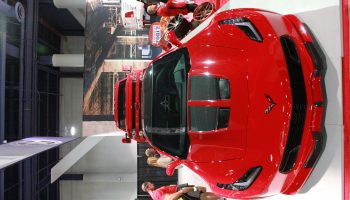 Overhead of Red Car showroom detailing
