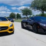 Yellow Benz next to Black Benz