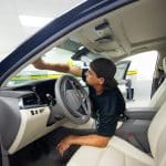 Man Cleaning Windshield