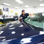 Man Cleaning Windshield