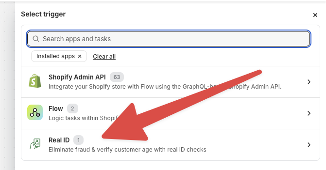Selecting the Real ID app within the Shopify Flow Triggers menu