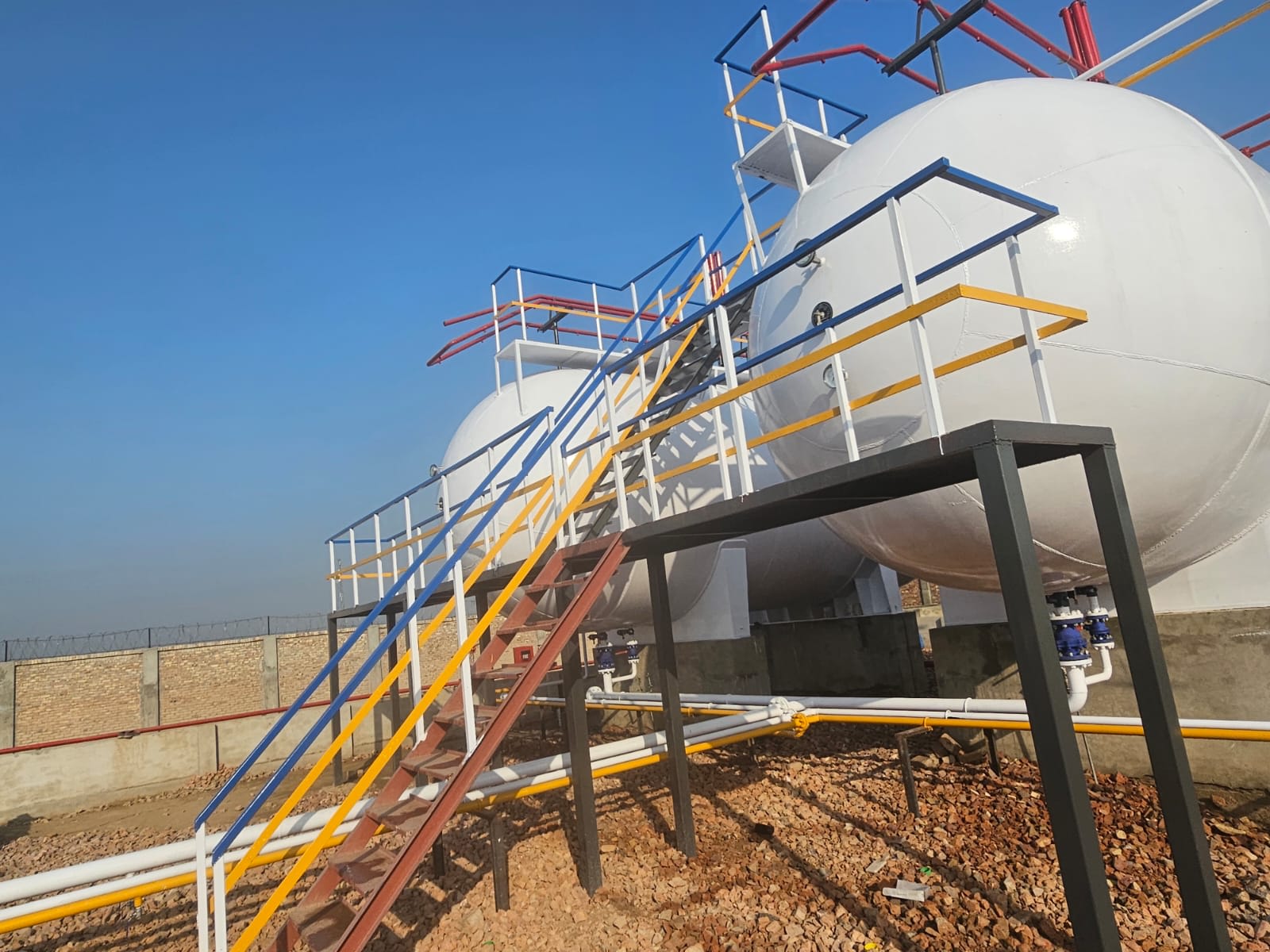 Restoration, sandblasting, and refurbishment of industrial gas storage tanks