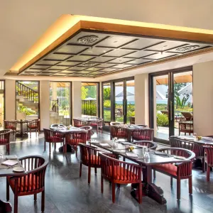 Niraamaya Retreats Backaters & Beyond in Kerala | Malabarküste | Kochi:  Niraamaya Retreats Kumarakom - Cafe Samsara