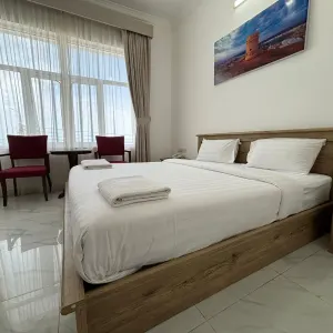 Tiwi Sunrise Motel in Küste:  Oman Tiwi Sunrise Resort Wohnbeispiel