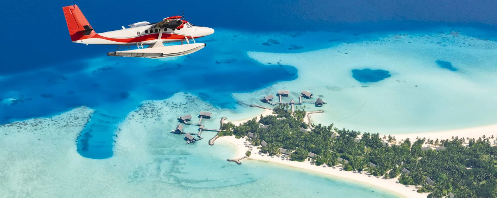 Malediven entdecken mit Tischler Reisen: Malediven Insel Wasserflugzeug