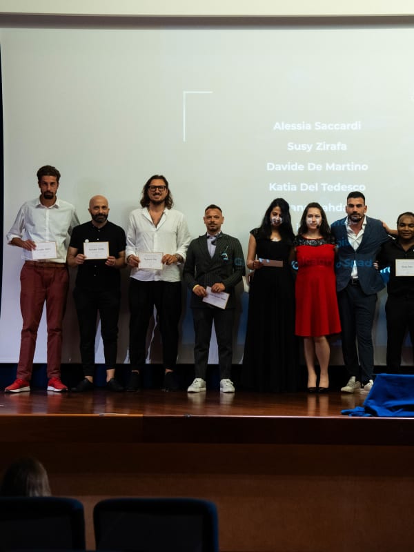 100x Mentality EVENT — Foto di gruppo sul palco durante la premiazione