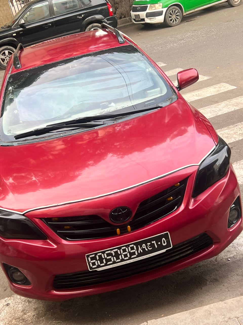 Toyota Corolla 2010 rouge, 69 000 km, très bon état