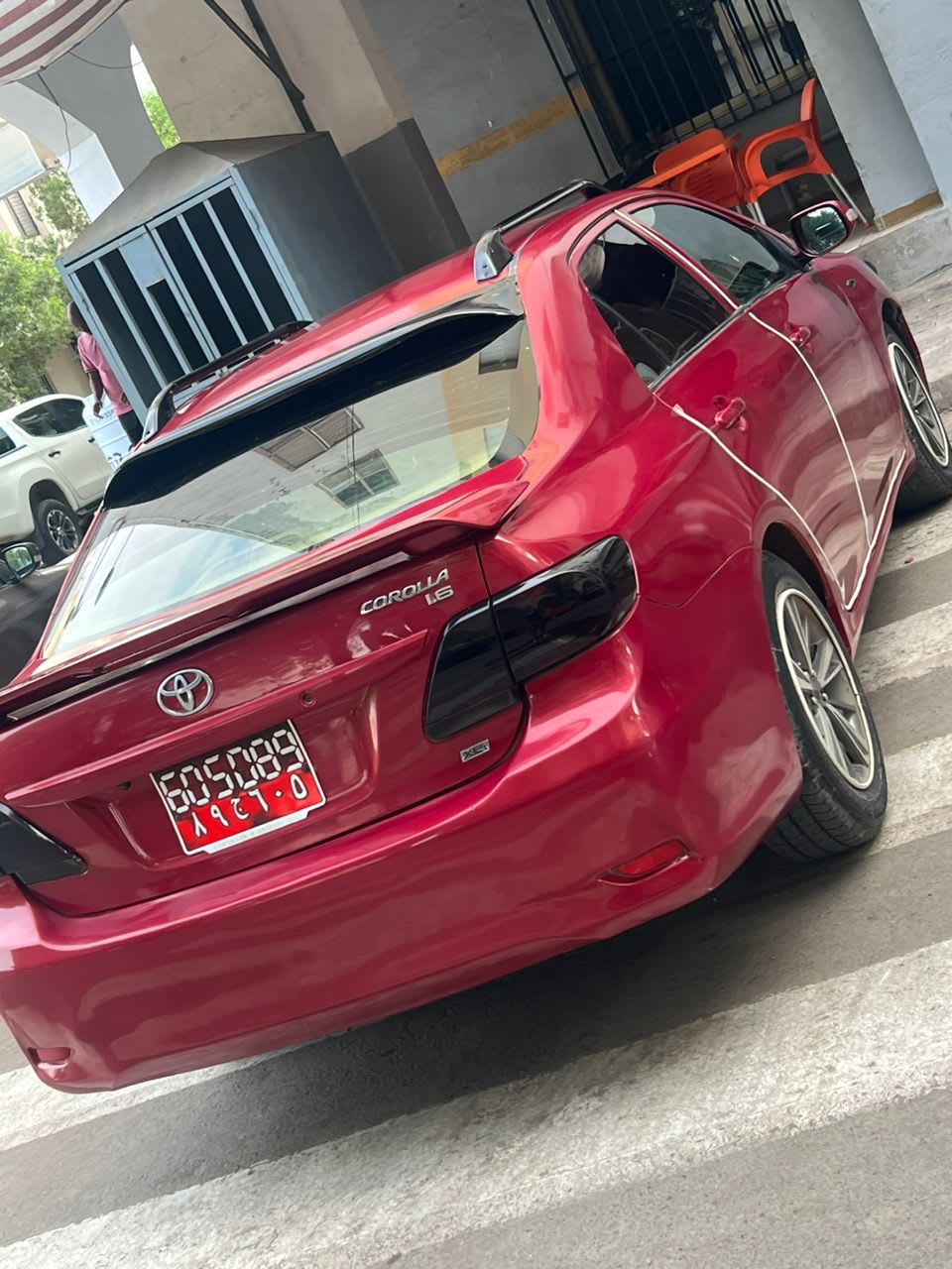 Toyota Corolla 2010 rouge, 69 000 km, très bon état