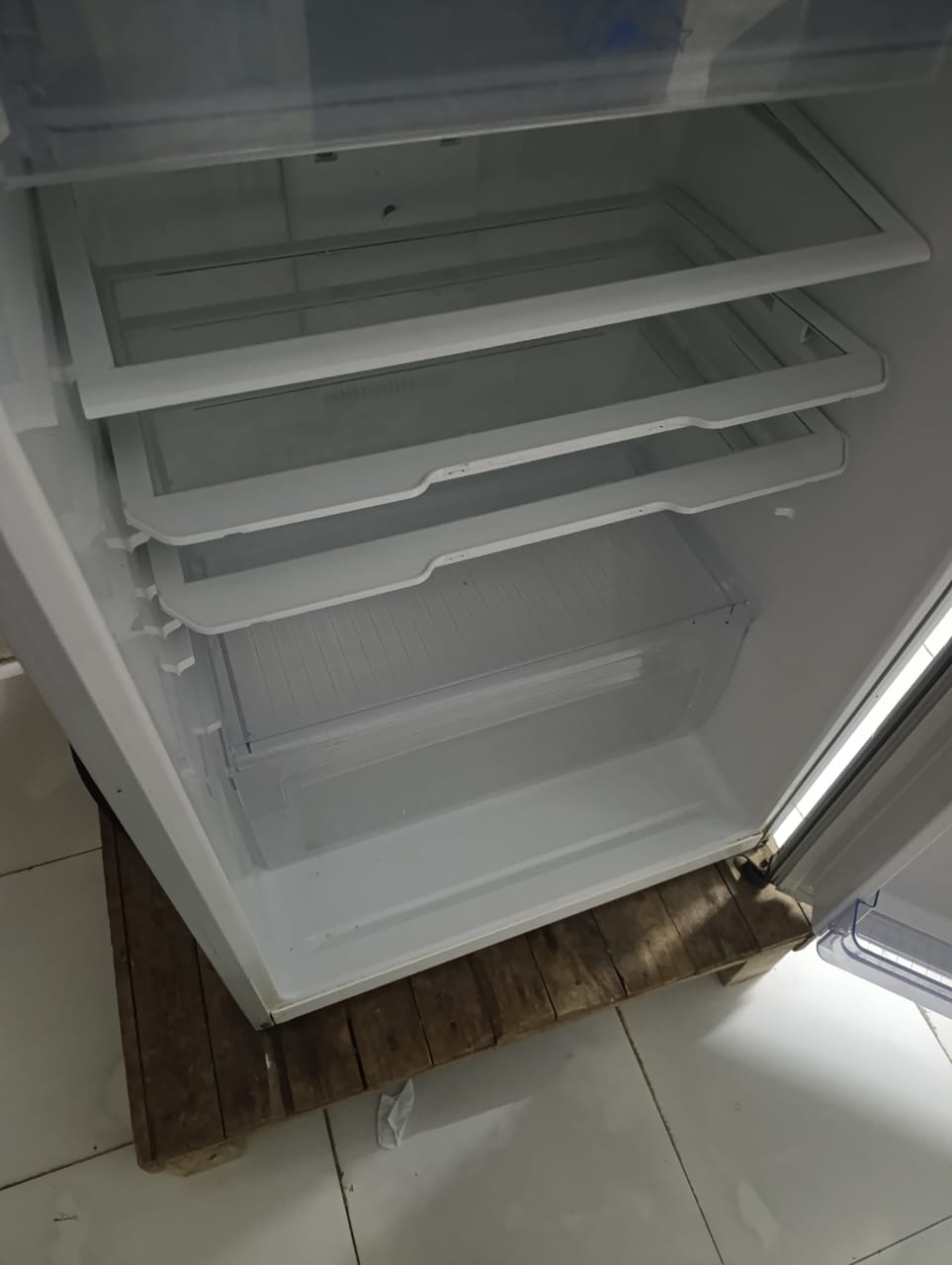 Réfrigérateur double porte gris en bon état