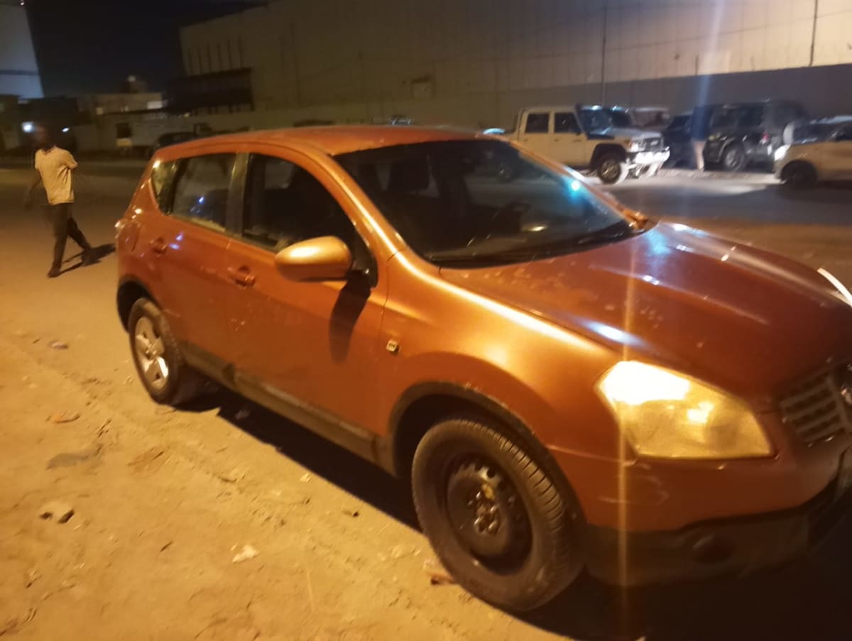 Nissan Qashqai orange, SUV compact fiable et pratique