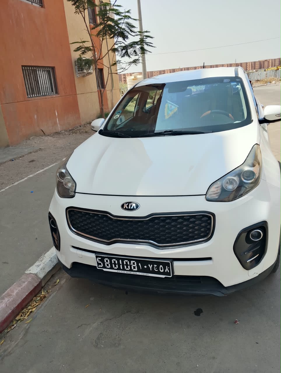 Kia Sportage blanche, look SUV moderne et soigné