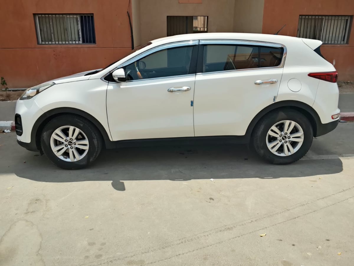Kia Sportage blanche, look SUV moderne et soigné
