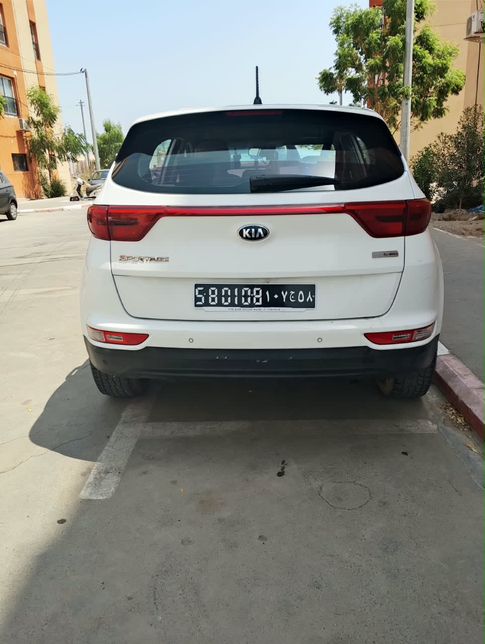 Kia Sportage blanche, look SUV moderne et soigné