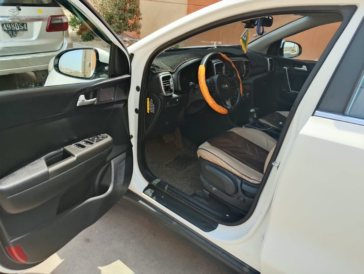 Kia Sportage blanche, look SUV moderne et soigné