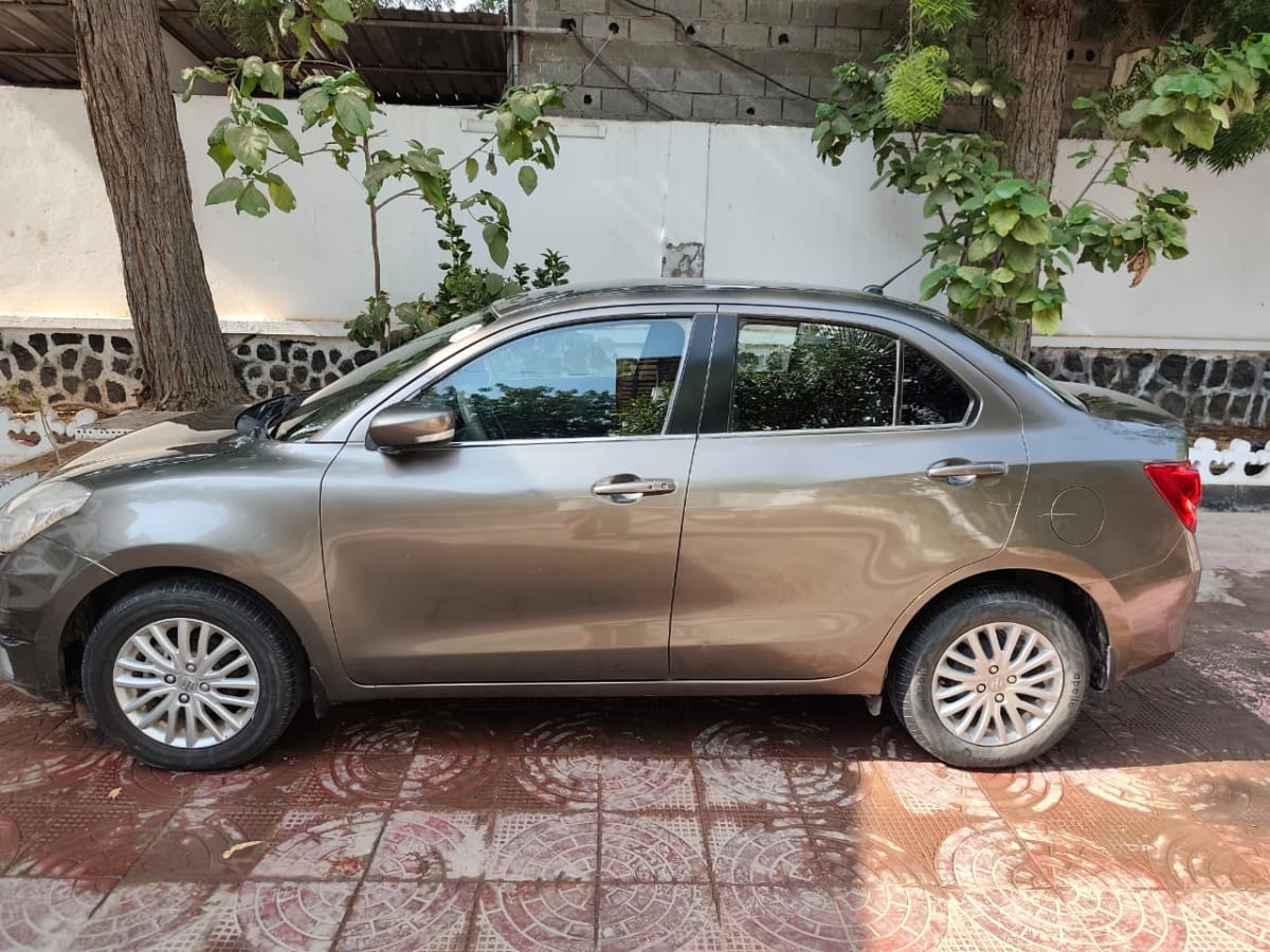 Suzuki Dzire grise en très bon état à saisir