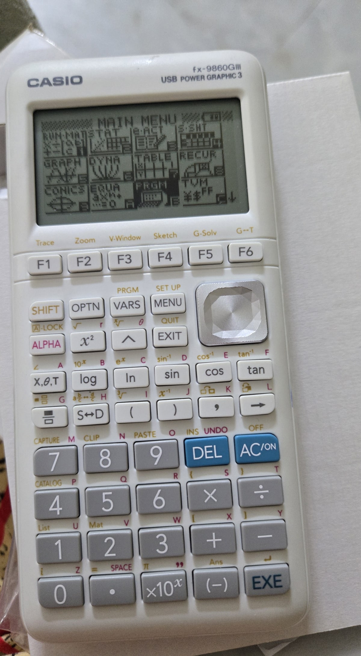 Calculatrice graphique Casio fx-9860GIII, quasi neuve