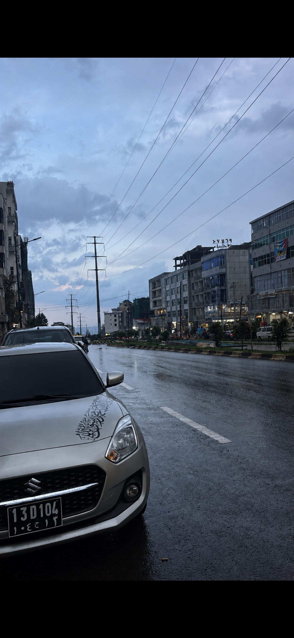 Suzuki Swift grise en excellent état, sans défaut
