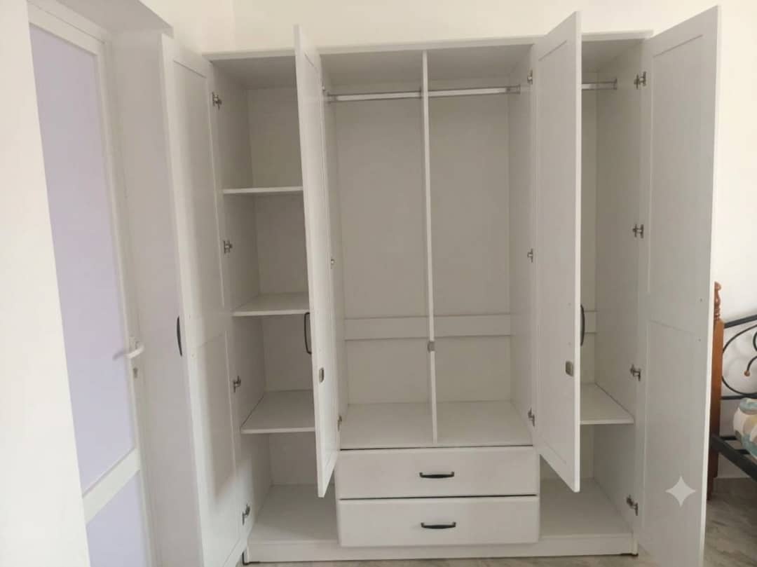 Lit double en fer forgé et bois avec matelas