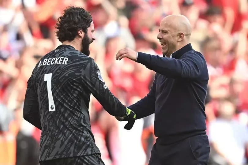 Goalkeeper Alisson celebrates title victory in a (Liver)pool of tears 