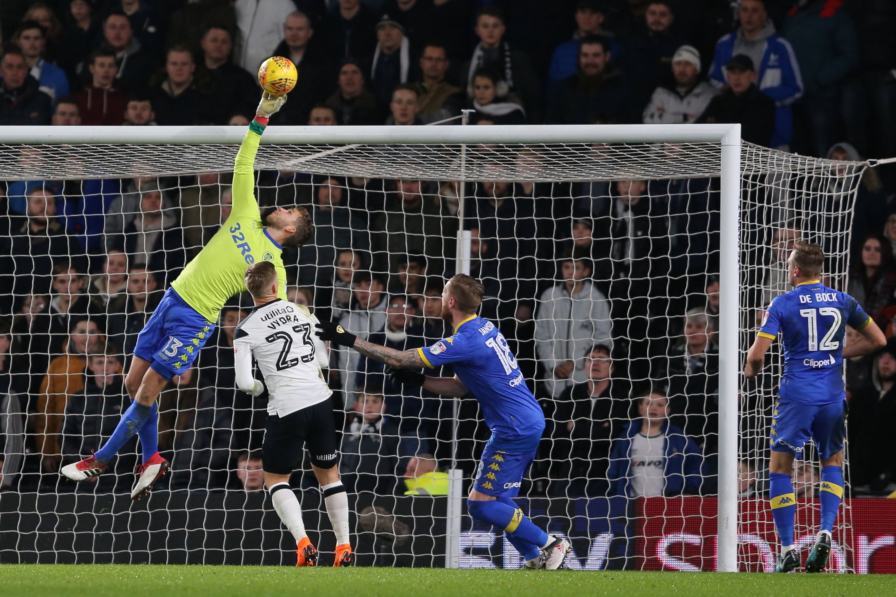 Leeds goalkeeper Felix Weidwald makes a top handed save vs Derby (Goalkeeper.com)