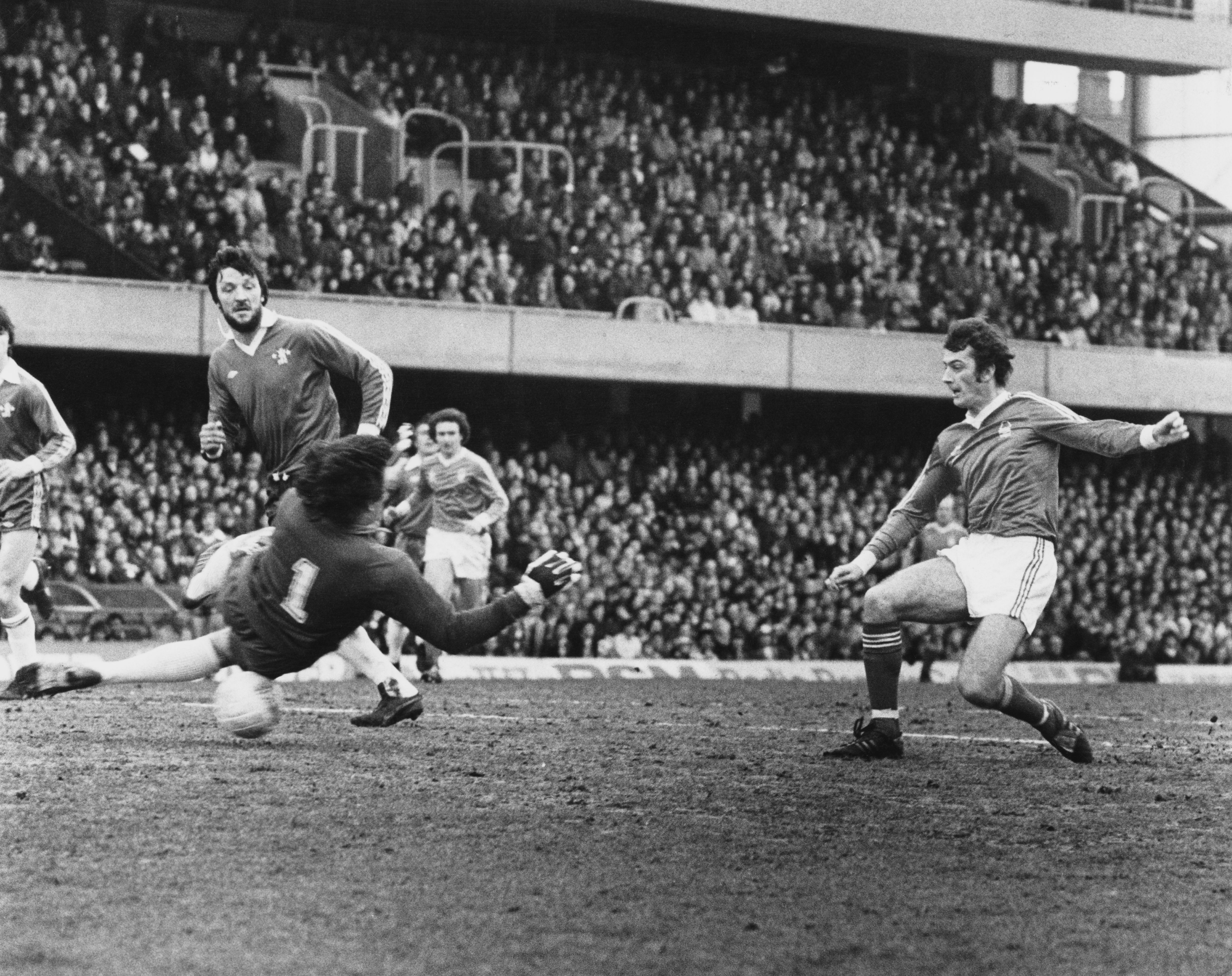 Petar Borota dives as the ball is slotted underneath him for Chelsea (Goalkeeper.com)