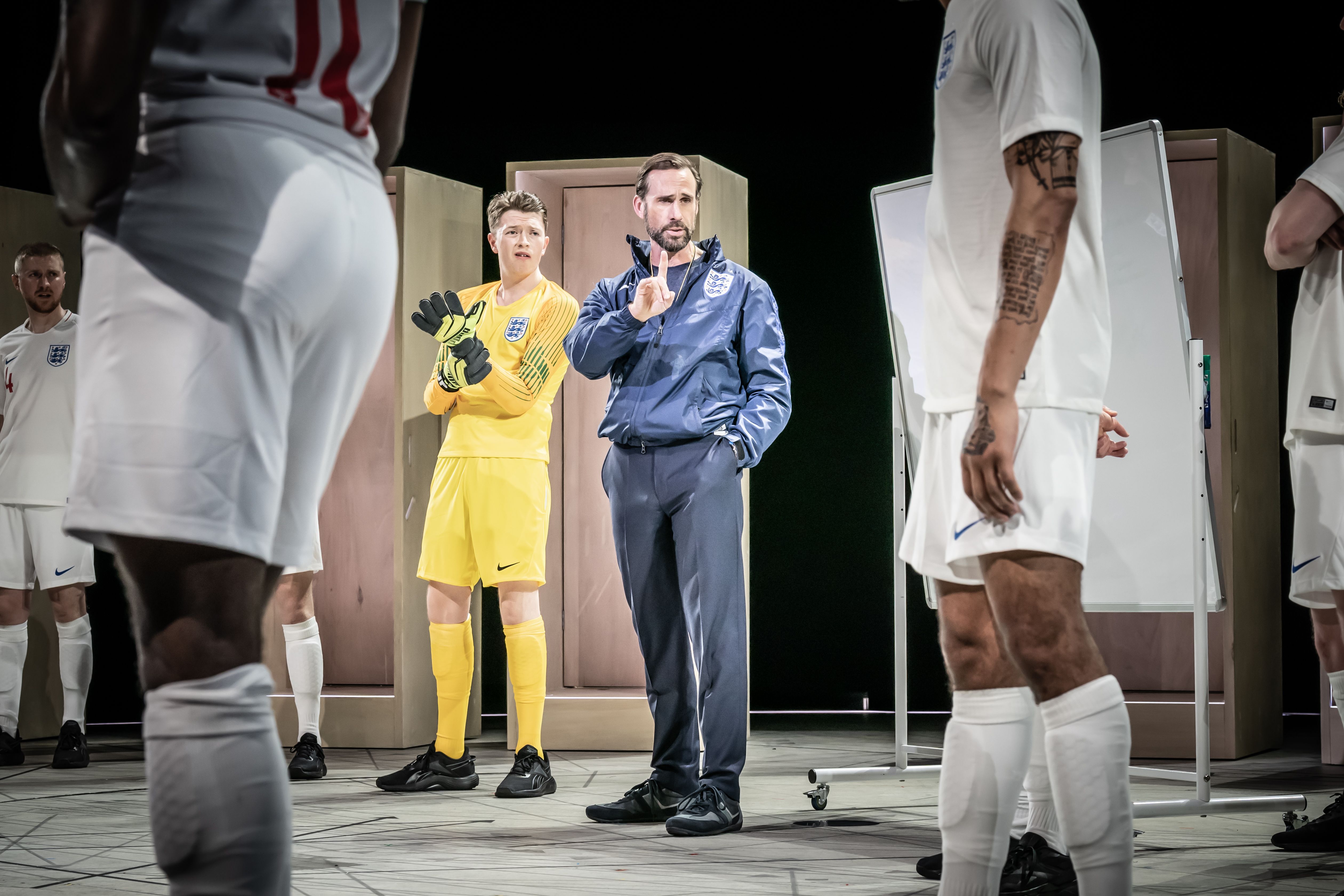 Josh Barrow (Jordan Pickford), Joseph Fiennes (Gareth Southgate) and Dear England cast at the National Theatre. Photo by Marc Brenner 0623.jpg